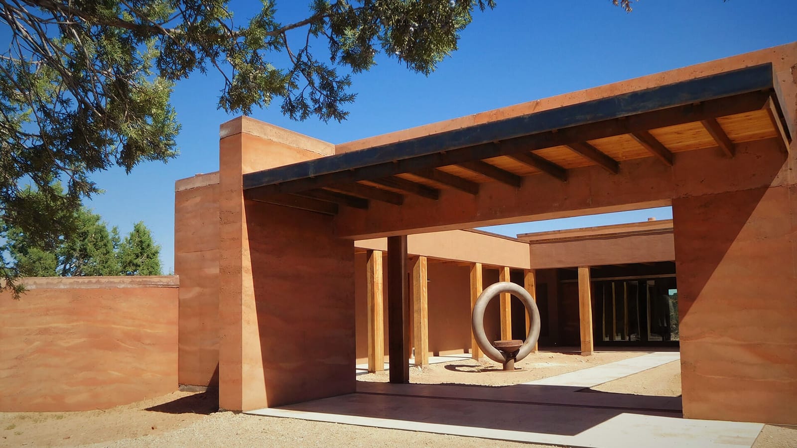 Rammed earth courtyard entry